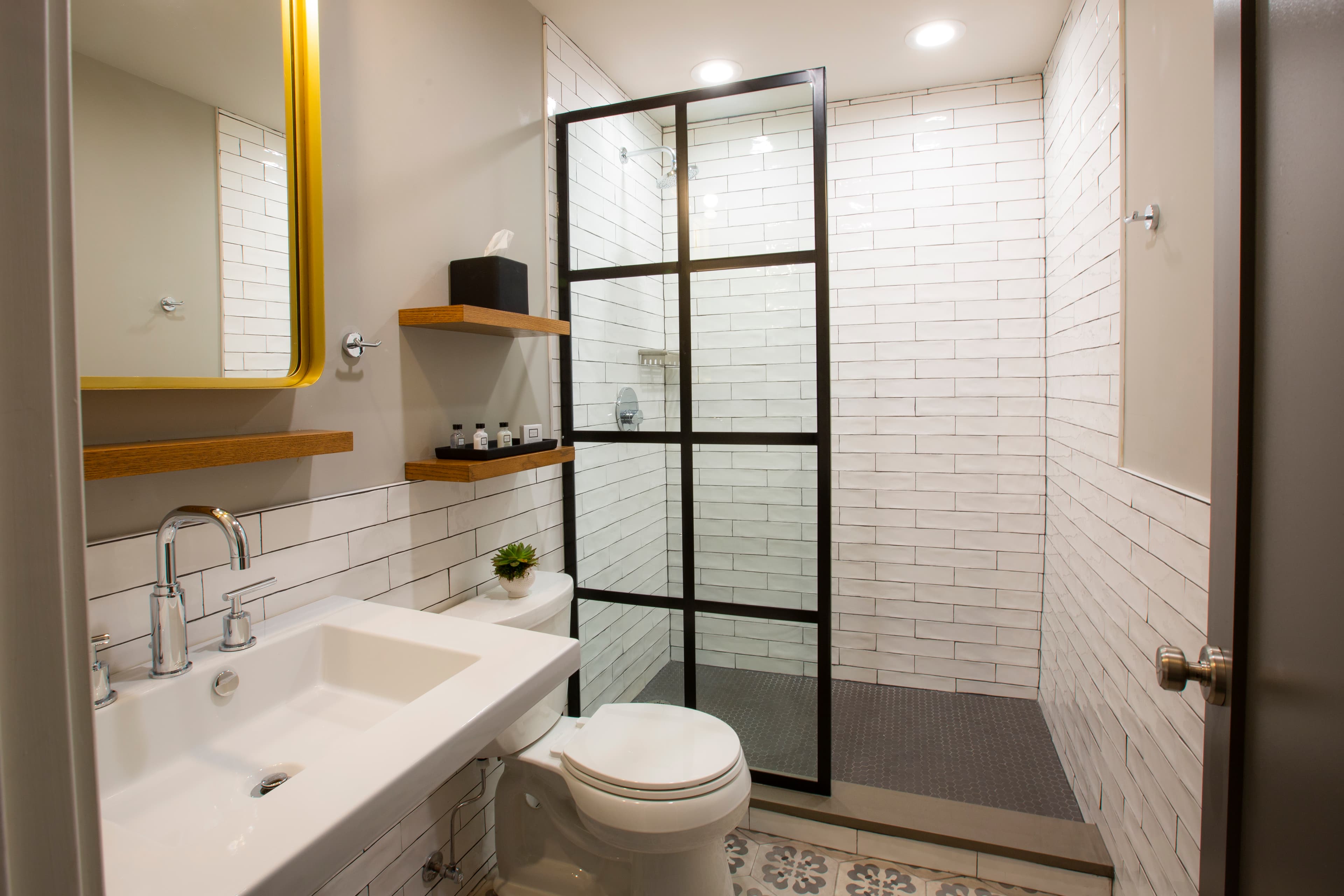 Paulina's ensuite full bathroom, complete with fluffy towels, complimentary toiletries and a large sink.